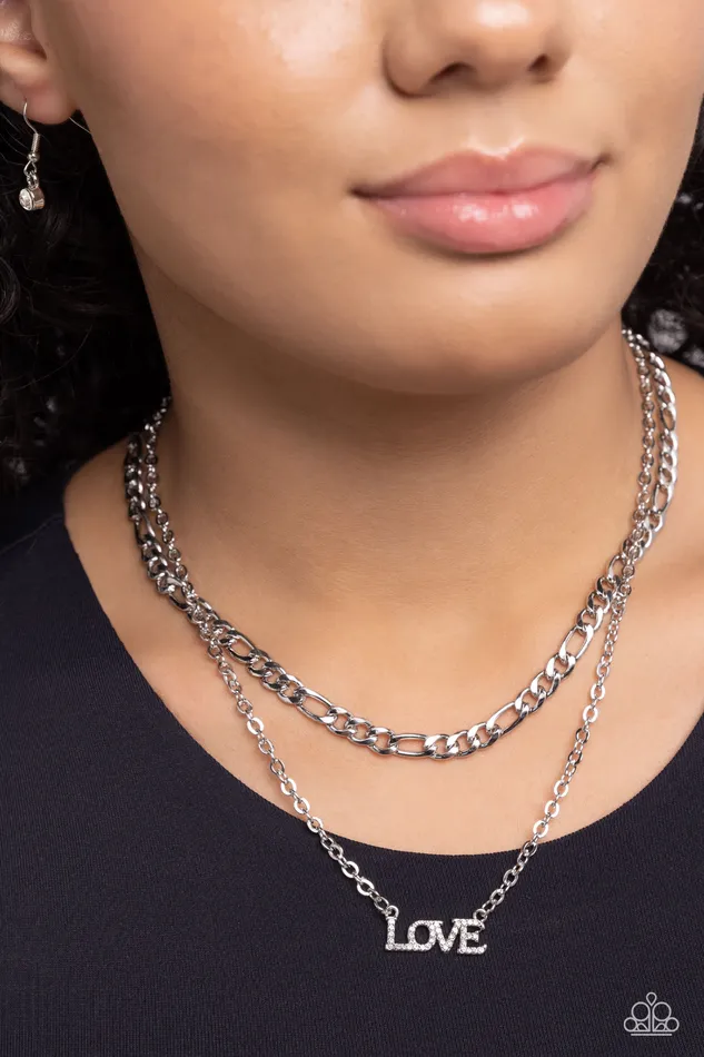 Paparazzi Accessories Necklaces Lovely Layers White Rhinestone LOVE Silver Layered Short Necklace Paparazzi