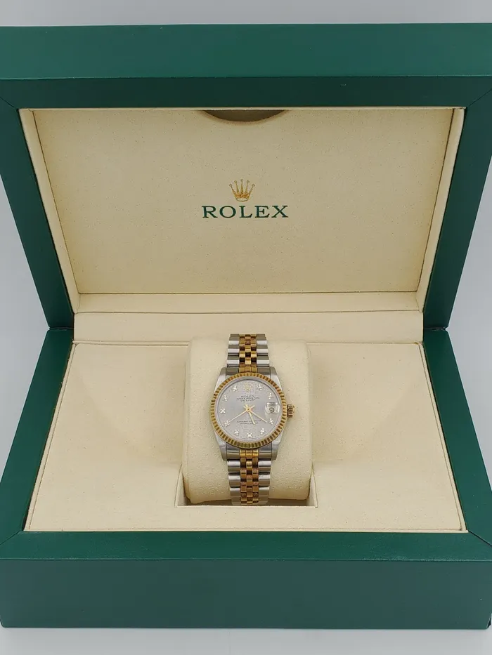 Rings Rolex Ladies Rolex Midsize 31mm DateJust Two Tone 18K Yellow Gold Stainless Steel Watch with Silver Diamond Dial and Fluted Bezel PreOwned 682735